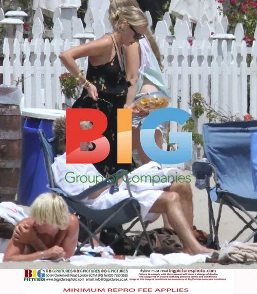 Kimberly Stewart Enjoys Beach Day with Family