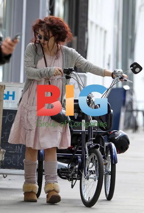 Helena Bonham Carter on Tricycle in London