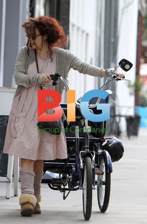 Helena Bonham Carter on Tricycle in London