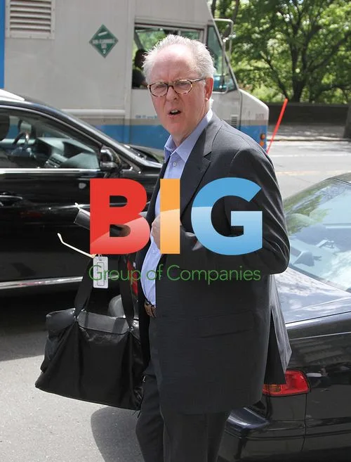 John Lithgow Leaving Apartment