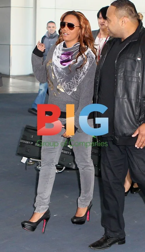 Mel B and Family Arrive in Sydney