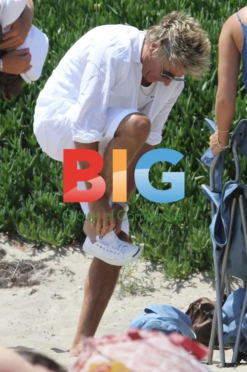 Kimberly Stewart Spends Day at Beach with Dad Rod