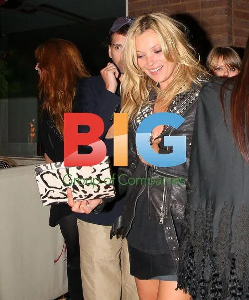 Kate Moss Leaving Le Petit Masonn