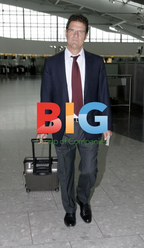 Fabio Capello Departs Heathrow