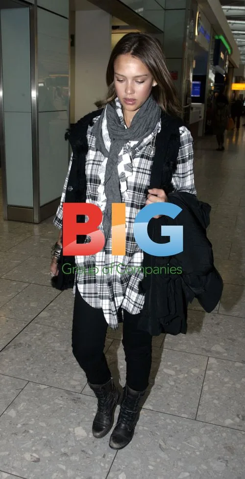 Jessica Alba Arrives at Heathrow