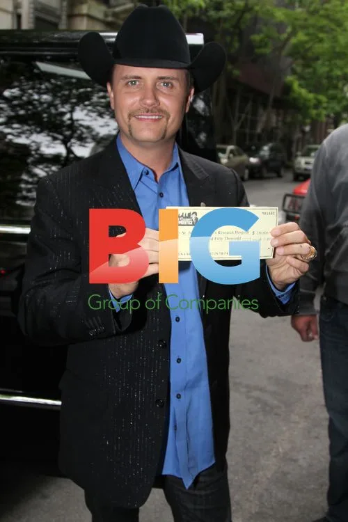 John Rich's $250,000 Charity Check
