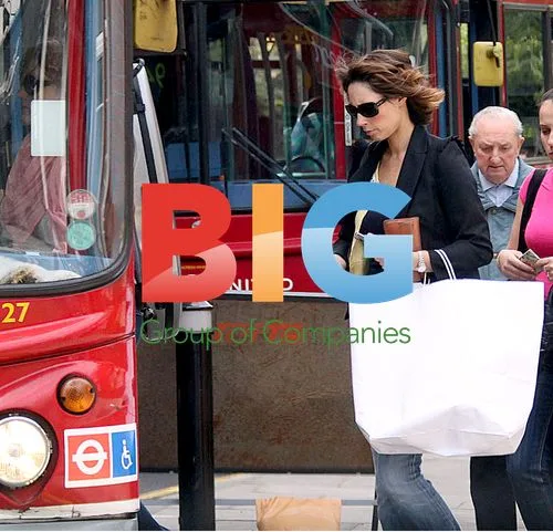 Alex Jones Waits for Bus in London