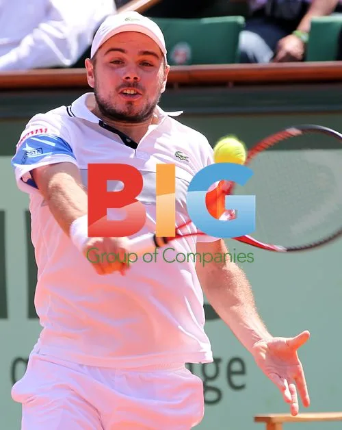 Stanislas Wawrinka hits shot at French Open