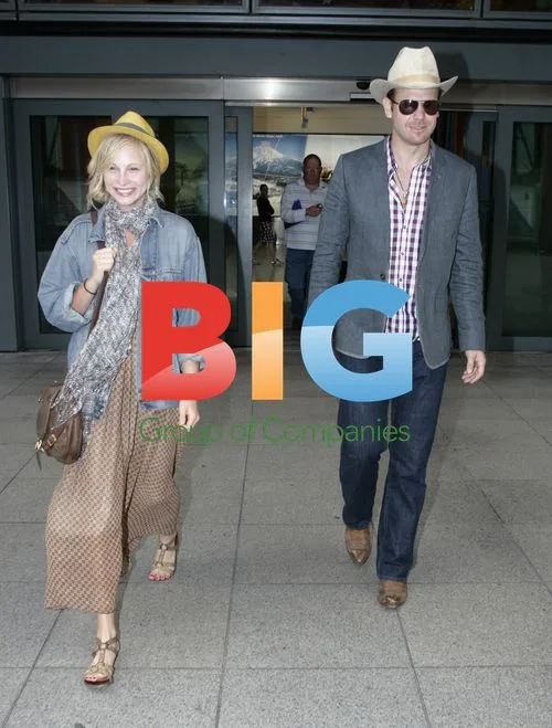 Matt Davis and Candice Accola at Heathrow