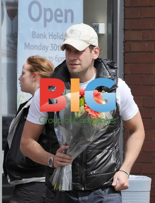 Greg Lake from Geordie Shore leaves Tesco with flowers
