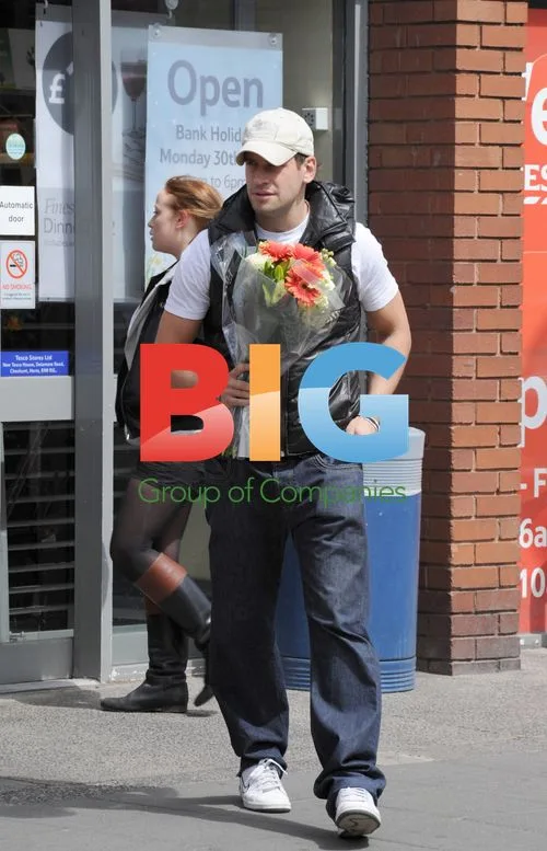 Greg Lake Leaves Tesco with Flowers