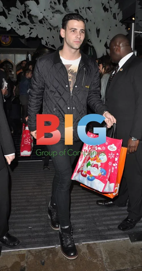 Celebrities leave Disney store in London