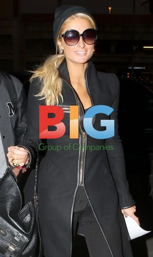 Paris Hilton Arrives at LAX
