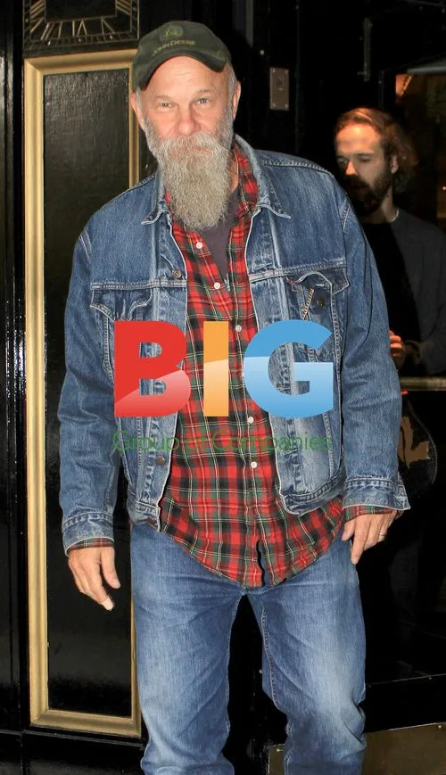 Blues Singer Seasick Steve Leaving Hotel