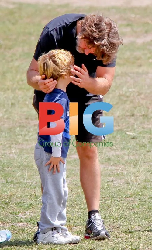 Russell Crowe with sons at park