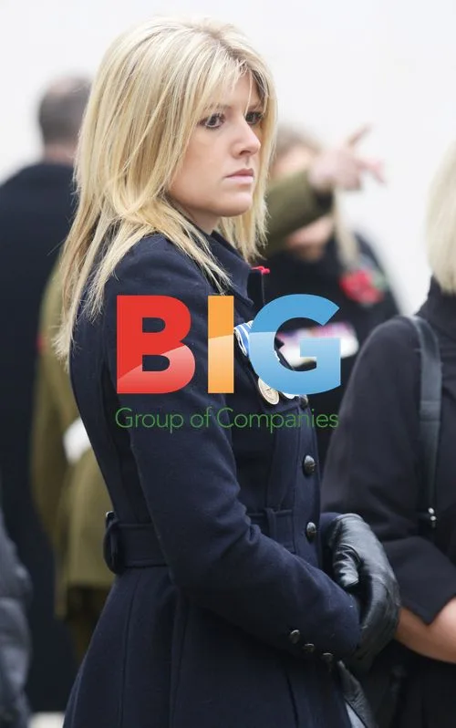 Gemma Polino Lays Flowers at Armistice Day Memorial