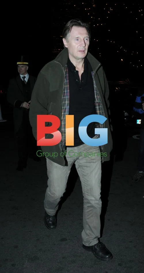 Liam Neeson Leaves Scotts with Friend
