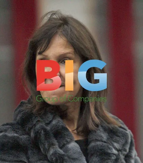 Arlene Phillips waits for car outside hotel
