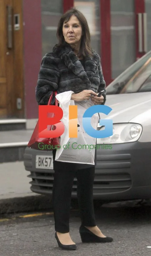 Arlene Phillips Waiting Outside London Hotel