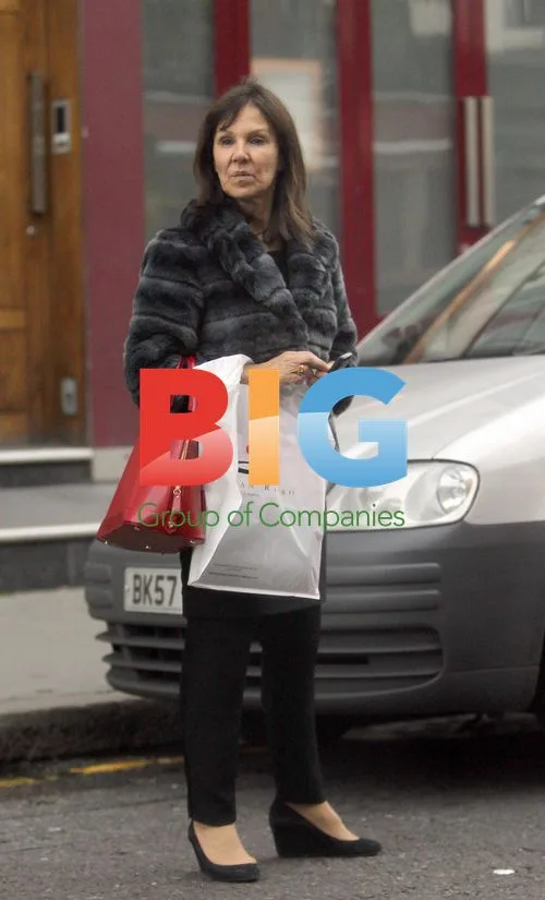 Arlene Phillips Waiting Outside London Hotel