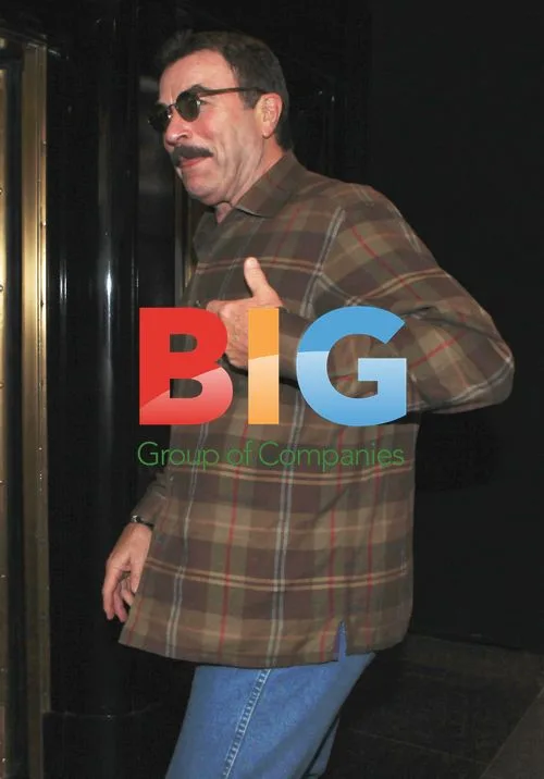 Tom Selleck Arrives in NYC