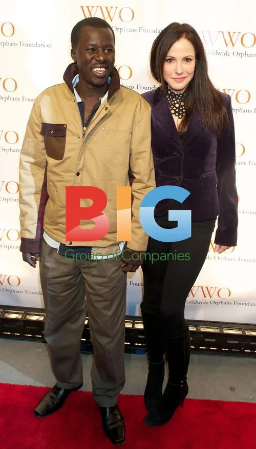Okello Kelo Sam and Mary Louise Parker at Worldwide Orphans Foundation Gala
