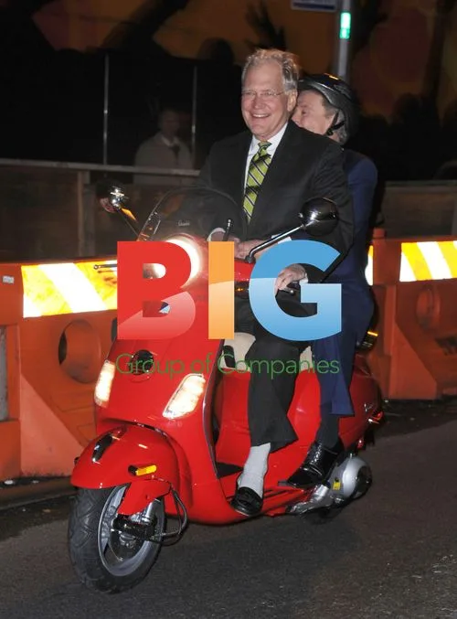 Regis Philbin Tries Driving Vespa on TV Set