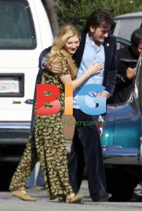 Charlie Sheen and Katheryn Winnick on set