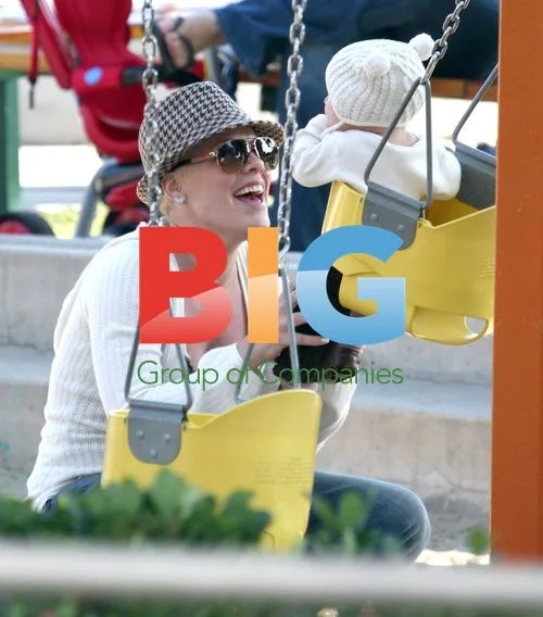 Pink with baby Willow at the park