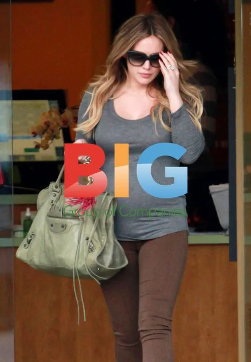 Hilary Duff Shows Off Baby Bump