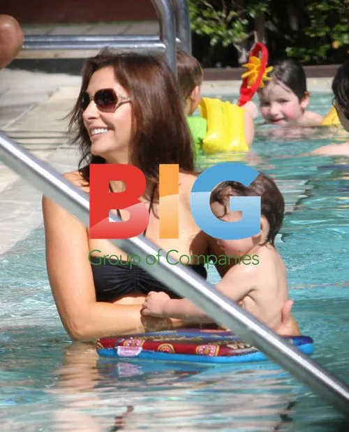 Ingrid Vandebosch and children at pool