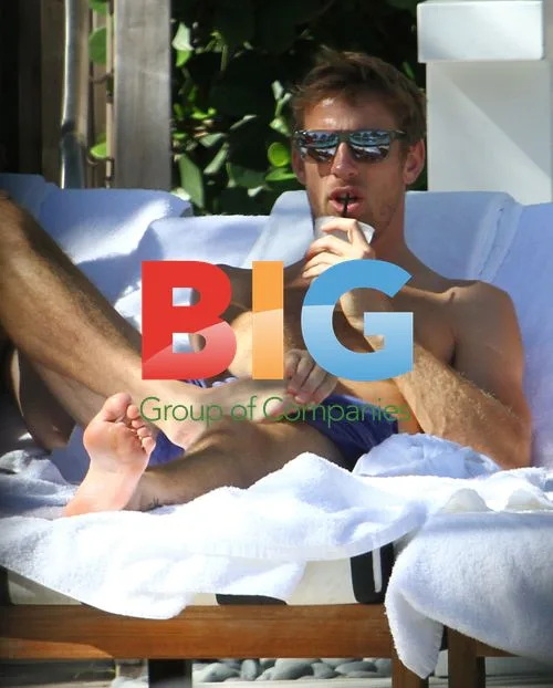 Jenson Button Relaxes Poolside in Miami