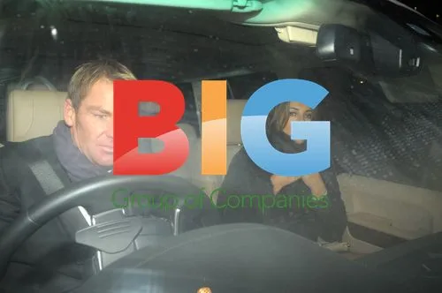 Liz Hurley and Shane Warne leaving C London