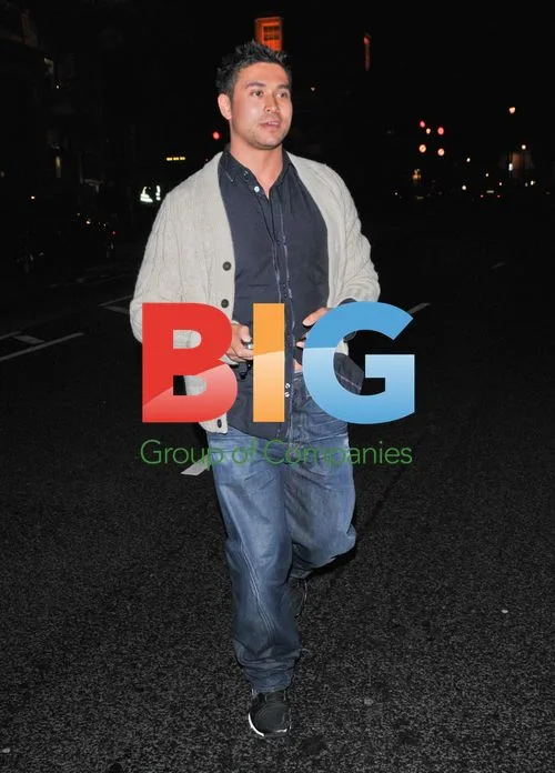 Rav Wilding and girlfriend leaving event