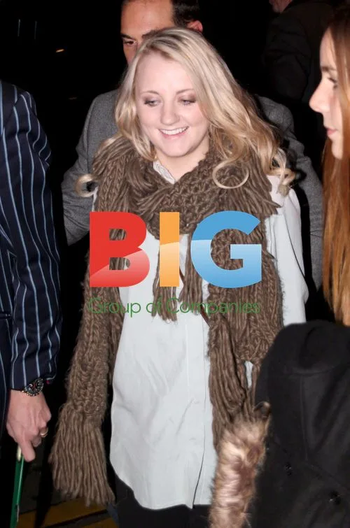 Evanna Lynch and Mark Williams Arrive in Paris