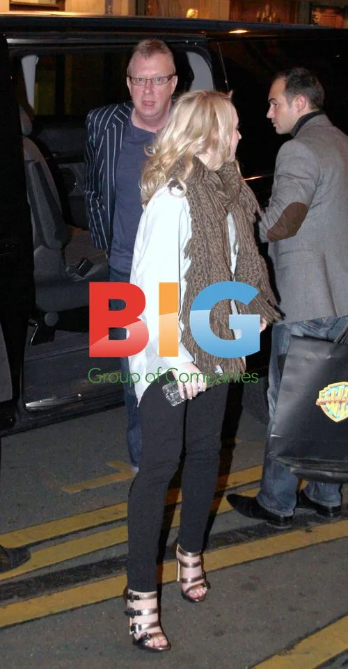 Evanna Lynch and Mark Williams arrive in Paris