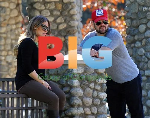 Hilary Duff and Mike Comrie play with dog in LA