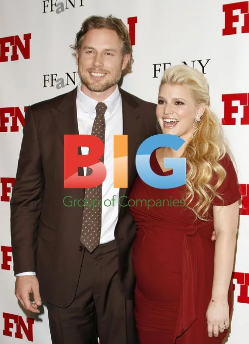 Jessica Simpson and Eric Johnson attend Footwear News Awards