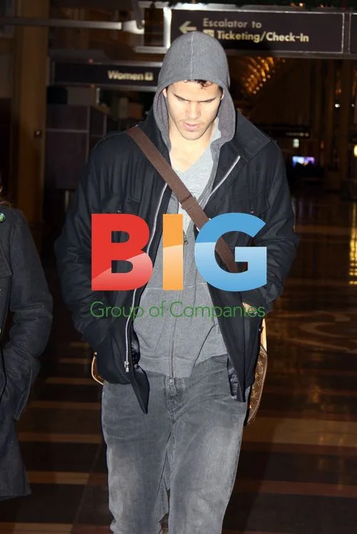 Kris Humphries at Airport with Mother