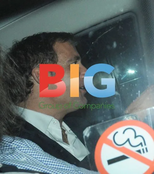 Clive Owen leaving Whisky Mist with mystery women