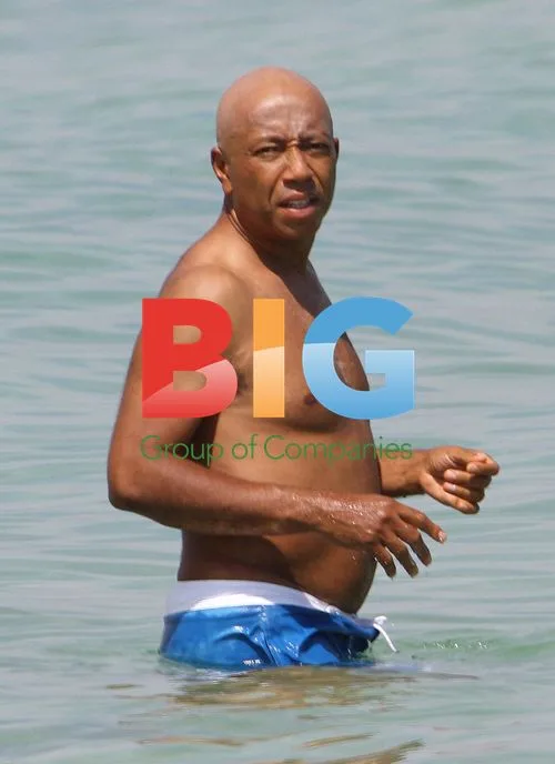 Russell Simmons with Vanessa and Angela in Miami