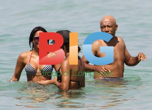 Russell Simmons with Vanessa and Angela Simmons in Miami