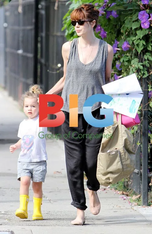 Michelle Monaghan picks up daughter from school