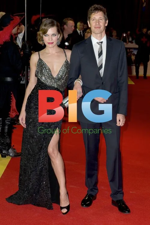 Milla Jovovich and Paul Anderson at The Three Musketeers Premiere