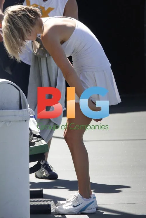 Ali Larter Playing Tennis