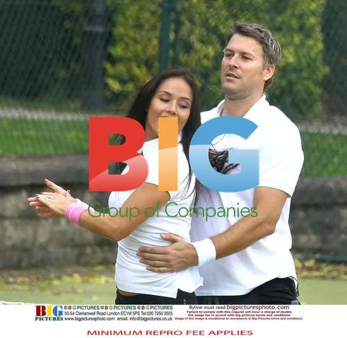 Dan Lobb and Katya Virshilas practice dance moves playing tennis