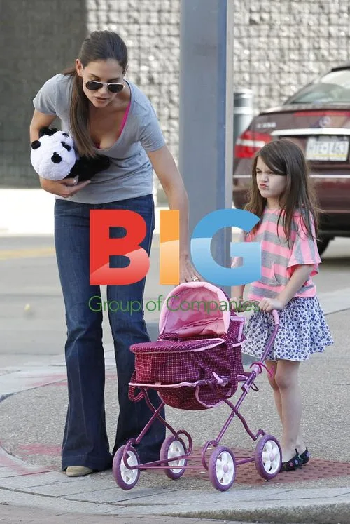 Katie Holmes and Tom Cruise with Suri in LA