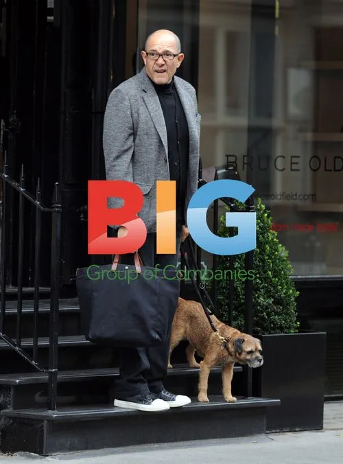 Fashion Designer Bruce Oldfield with Dog