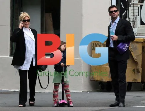 Hugh Jackman Walks with Family