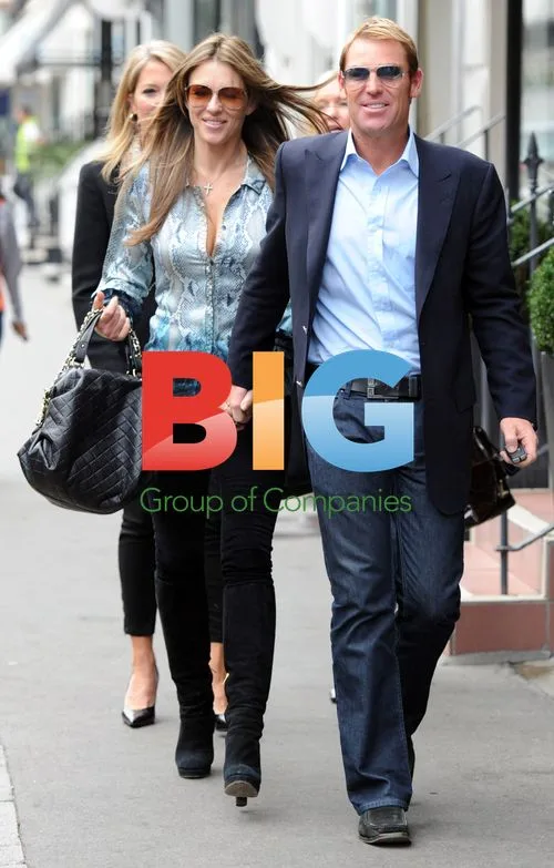 Elizabeth Hurley and Shane Warne Leaving Restaurant